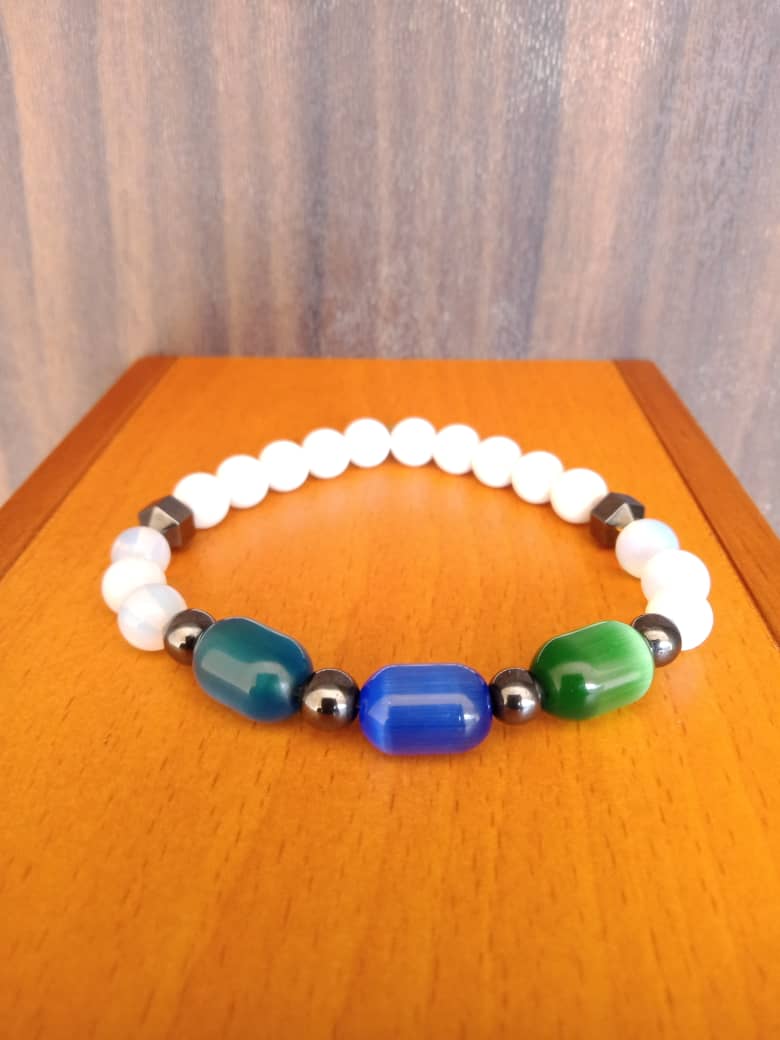 white stones, cat eye stone and silver stone